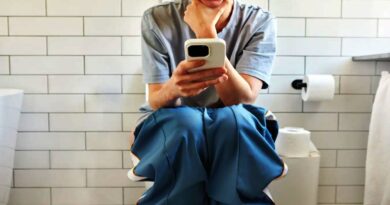 using phone in toilet