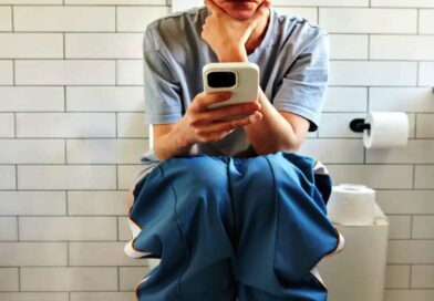 using phone in toilet